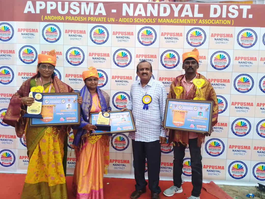 Best teacher award received from Appusma in Nandyal district.